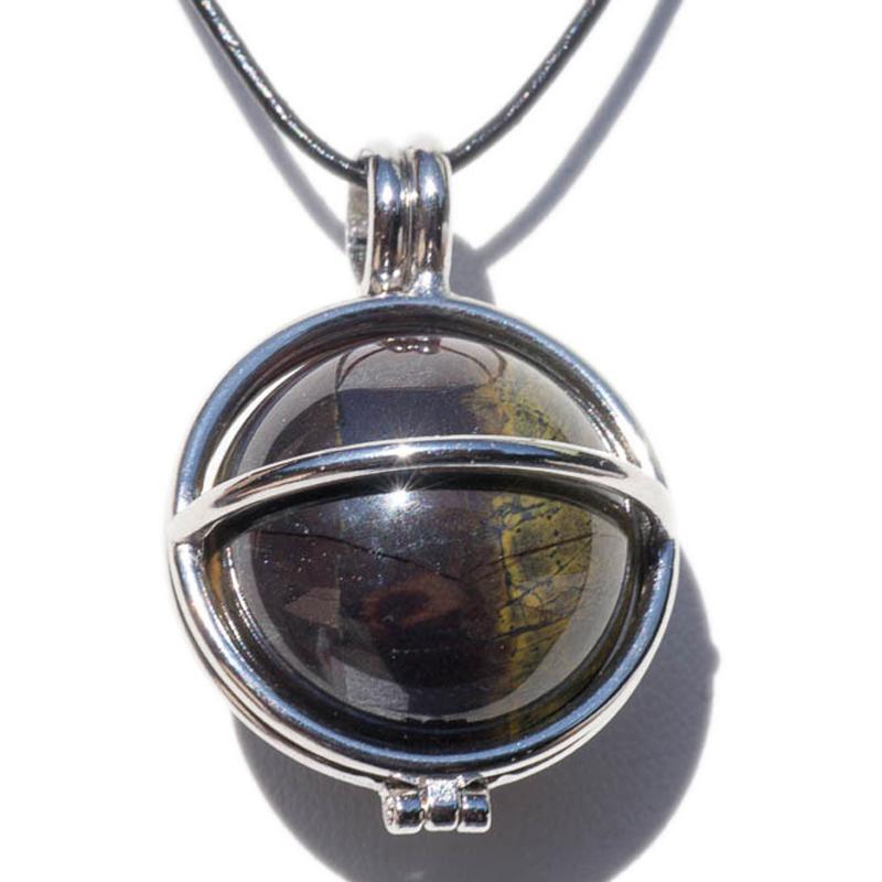 Pendentif boule oeil de fer Afrique du Sud A dans cage acier inoxydable